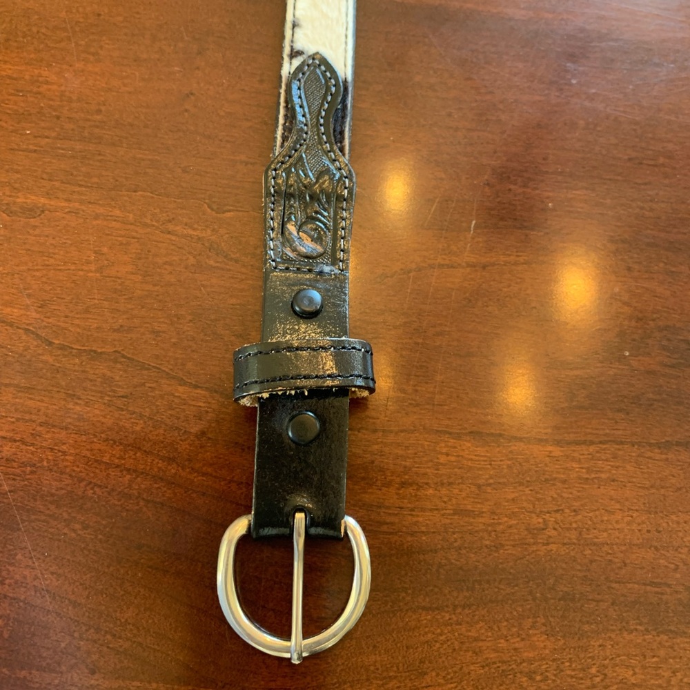 Western belt. Unknown brand Size 30. Horse hair with black and white cow print.